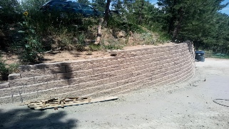 House framed on new site requires proper drainage from the start.